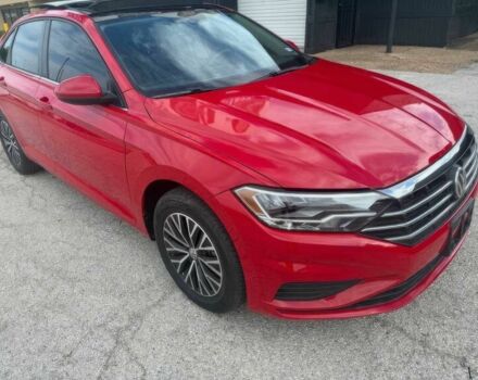 Красный Фольксваген Джетта, объемом двигателя 1.4 л и пробегом 24 тыс. км за 11700 $, фото 2 на Automoto.ua