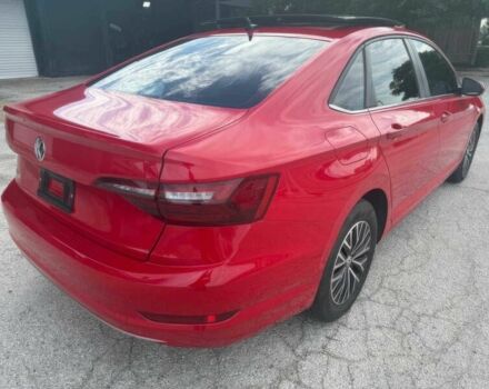 Красный Фольксваген Джетта, объемом двигателя 1.4 л и пробегом 24 тыс. км за 11700 $, фото 5 на Automoto.ua