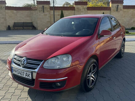 Красный Фольксваген Джетта, объемом двигателя 1.6 л и пробегом 125 тыс. км за 6000 $, фото 1 на Automoto.ua