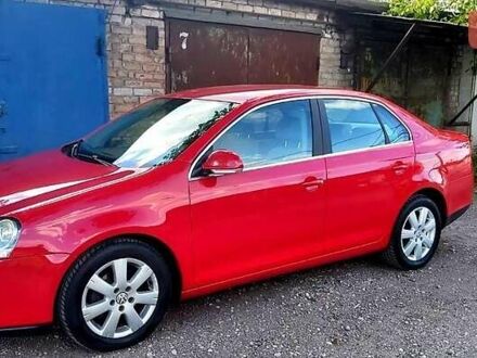 Красный Фольксваген Джетта, объемом двигателя 1.4 л и пробегом 198 тыс. км за 6000 $, фото 1 на Automoto.ua