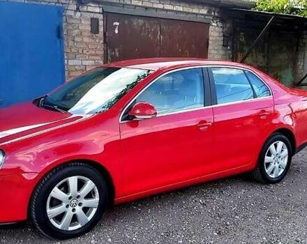 Красный Фольксваген Джетта, объемом двигателя 1.4 л и пробегом 198 тыс. км за 6000 $, фото 1 на Automoto.ua
