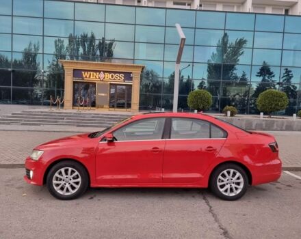 Фольксваген Джетта 2014 в Запорожье на Automoto.ua Красный Фольксваген Джетта, объемом двигателя 1.8 л и пробегом 94 тыс. км за 9000 $, фото 1 на Automoto.ua