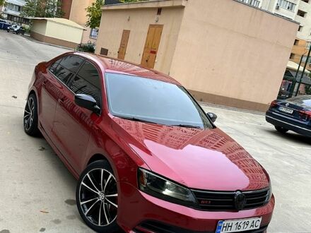 Красный Фольксваген Джетта, объемом двигателя 1.4 л и пробегом 125 тыс. км за 9800 $, фото 1 на Automoto.ua