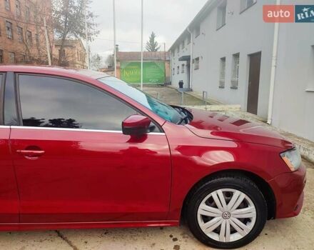 Червоний Фольксваген Джетта, об'ємом двигуна 1.4 л та пробігом 98 тис. км за 11300 $, фото 1 на Automoto.ua
