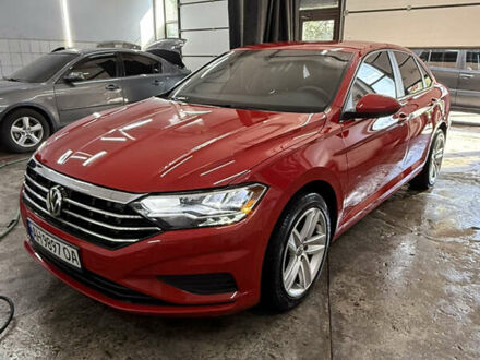 Червоний Фольксваген Джетта, об'ємом двигуна 1.39 л та пробігом 28 тис. км за 14999 $, фото 1 на Automoto.ua