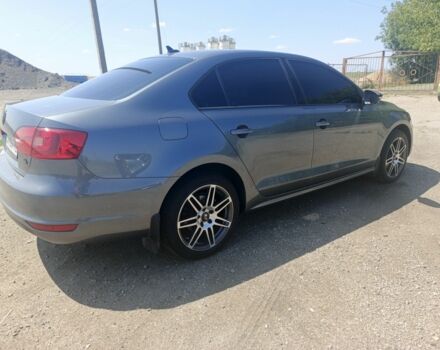 Серый Фольксваген Джетта, объемом двигателя 1.4 л и пробегом 84 тыс. км за 11500 $, фото 3 на Automoto.ua