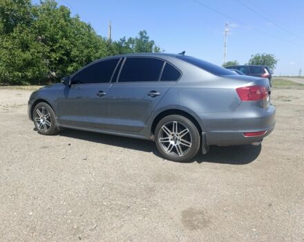 Серый Фольксваген Джетта, объемом двигателя 1.4 л и пробегом 84 тыс. км за 11500 $, фото 1 на Automoto.ua