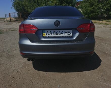 Серый Фольксваген Джетта, объемом двигателя 1.4 л и пробегом 84 тыс. км за 11500 $, фото 2 на Automoto.ua