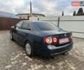 Серый Фольксваген Джетта, объемом двигателя 1.4 л и пробегом 230 тыс. км за 4999 $, фото 7 на Automoto.ua