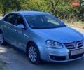 Фольксваген Джетта 2008 в Вознесенске на Automoto.ua Серый Фольксваген Джетта, объемом двигателя 1.6 л и пробегом 221 тыс. км за 6200 $, фото 1 на Automoto.ua