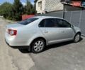 Сірий Фольксваген Джетта, об'ємом двигуна 1.39 л та пробігом 162 тис. км за 10900 $, фото 4 на Automoto.ua