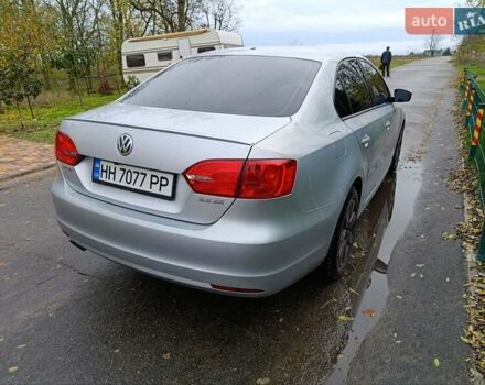 Серый Фольксваген Джетта, объемом двигателя 2.48 л и пробегом 208 тыс. км за 10499 $, фото 5 на Automoto.ua