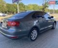 Сірий Фольксваген Джетта, об'ємом двигуна 1.39 л та пробігом 327 тис. км за 7600 $, фото 4 на Automoto.ua