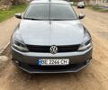 Серый Фольксваген Джетта, объемом двигателя 1.4 л и пробегом 220 тыс. км за 7800 $, фото 1 на Automoto.ua