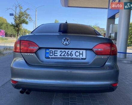 Сірий Фольксваген Джетта, об'ємом двигуна 1.39 л та пробігом 327 тис. км за 7600 $, фото 5 на Automoto.ua