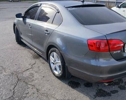 Серый Фольксваген Джетта, объемом двигателя 2 л и пробегом 260 тыс. км за 7500 $, фото 3 на Automoto.ua