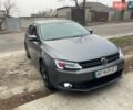 Серый Фольксваген Джетта, объемом двигателя 1.97 л и пробегом 305 тыс. км за 8500 $, фото 2 на Automoto.ua