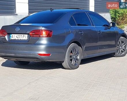 Сірий Фольксваген Джетта, об'ємом двигуна 1.4 л та пробігом 218 тис. км за 9300 $, фото 3 на Automoto.ua