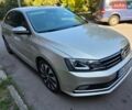 Серый Фольксваген Джетта, объемом двигателя 1.4 л и пробегом 230 тыс. км за 8800 $, фото 1 на Automoto.ua