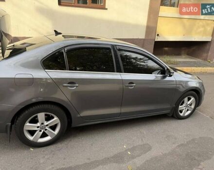 Серый Фольксваген Джетта, объемом двигателя 1.97 л и пробегом 145 тыс. км за 12000 $, фото 2 на Automoto.ua