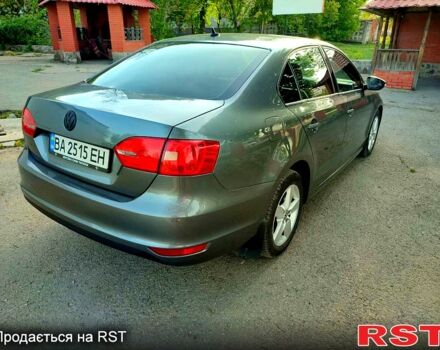 Серый Фольксваген Джетта, объемом двигателя 1.4 л и пробегом 168 тыс. км за 8400 $, фото 1 на Automoto.ua