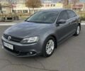 Сірий Фольксваген Джетта, об'ємом двигуна 2 л та пробігом 200 тис. км за 9700 $, фото 1 на Automoto.ua
