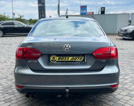 Серый Фольксваген Джетта, объемом двигателя 1.4 л и пробегом 290 тыс. км за 8990 $, фото 5 на Automoto.ua