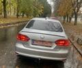 Серый Фольксваген Джетта, объемом двигателя 1.6 л и пробегом 240 тыс. км за 9500 $, фото 8 на Automoto.ua