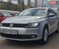 Серый Фольксваген Джетта, объемом двигателя 1.39 л и пробегом 155 тыс. км за 7599 $, фото 2 на Automoto.ua