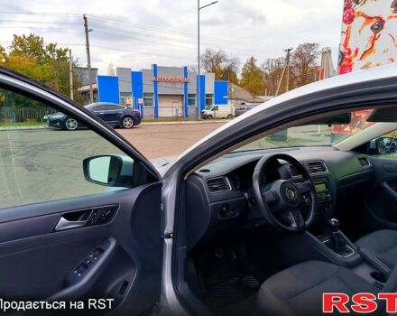 Фольксваген Джетта 2013 в Лубнах на Automoto.ua Серый Фольксваген Джетта, объемом двигателя 2 л и пробегом 260 тыс. км за 6700 $, фото 7 на Automoto.ua