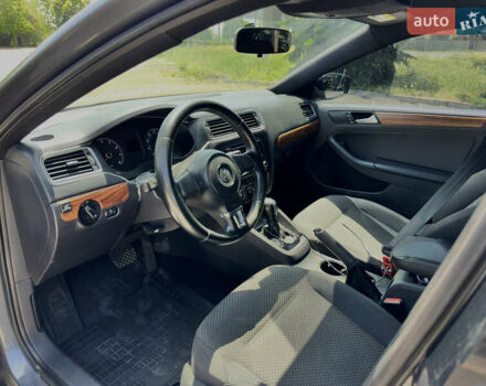 Сірий Фольксваген Джетта, об'ємом двигуна 2 л та пробігом 312 тис. км за 7950 $, фото 11 на Automoto.ua