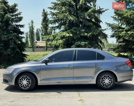 Сірий Фольксваген Джетта, об'ємом двигуна 2 л та пробігом 312 тис. км за 7950 $, фото 2 на Automoto.ua