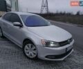 Серый Фольксваген Джетта, объемом двигателя 1.8 л и пробегом 135 тыс. км за 9400 $, фото 1 на Automoto.ua