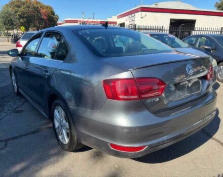 Фольксваген Джетта 2013 у Житомирі на Automoto.ua Сірий Фольксваген Джетта, об'ємом двигуна 1.4 л та пробігом 80 тис. км за 1900 $, фото 3 на Automoto.ua