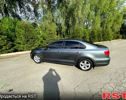 Фольксваген Джетта 2013 в Киеве на Automoto.ua Серый Фольксваген Джетта, объемом двигателя 2 л и пробегом 179 тыс. км за 8700 $, фото 2 на Automoto.ua