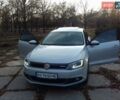 Серый Фольксваген Джетта, объемом двигателя 1.4 л и пробегом 150 тыс. км за 11500 $, фото 1 на Automoto.ua