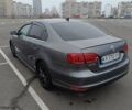 Серый Фольксваген Джетта, объемом двигателя 1.39 л и пробегом 128 тыс. км за 9500 $, фото 6 на Automoto.ua
