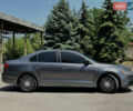 Сірий Фольксваген Джетта, об'ємом двигуна 2 л та пробігом 312 тис. км за 7950 $, фото 4 на Automoto.ua