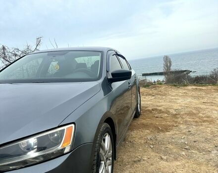 Серый Фольксваген Джетта, объемом двигателя 2 л и пробегом 240 тыс. км за 8700 $, фото 2 на Automoto.ua