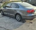 Серый Фольксваген Джетта, объемом двигателя 1.8 л и пробегом 176 тыс. км за 9200 $, фото 2 на Automoto.ua