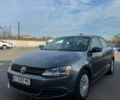 Серый Фольксваген Джетта, объемом двигателя 1.8 л и пробегом 167 тыс. км за 7700 $, фото 1 на Automoto.ua