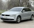 Серый Фольксваген Джетта, объемом двигателя 1.4 л и пробегом 220 тыс. км за 7799 $, фото 2 на Automoto.ua
