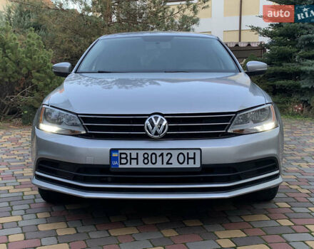 Серый Фольксваген Джетта, объемом двигателя 1.4 л и пробегом 113 тыс. км за 9900 $, фото 2 на Automoto.ua