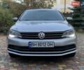 Серый Фольксваген Джетта, объемом двигателя 1.4 л и пробегом 113 тыс. км за 9900 $, фото 2 на Automoto.ua