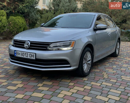 Серый Фольксваген Джетта, объемом двигателя 1.4 л и пробегом 113 тыс. км за 9900 $, фото 4 на Automoto.ua
