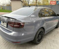 Серый Фольксваген Джетта, объемом двигателя 1.8 л и пробегом 123 тыс. км за 10000 $, фото 4 на Automoto.ua
