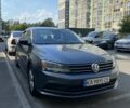 Серый Фольксваген Джетта, объемом двигателя 1.4 л и пробегом 172 тыс. км за 9490 $, фото 1 на Automoto.ua