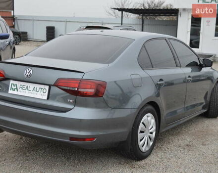 Серый Фольксваген Джетта, объемом двигателя 1.4 л и пробегом 110 тыс. км за 12800 $, фото 1 на Automoto.ua