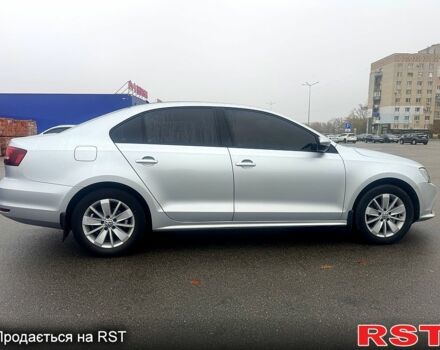 Серый Фольксваген Джетта, объемом двигателя 1.6 л и пробегом 138 тыс. км за 13500 $, фото 4 на Automoto.ua