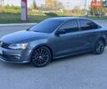 Серый Фольксваген Джетта, объемом двигателя 1.8 л и пробегом 223 тыс. км за 11500 $, фото 1 на Automoto.ua
